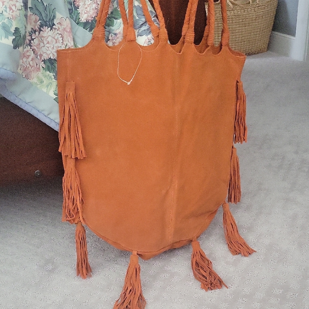 EARTHBOUND Orange Tassel Tote Bag with Bohemian Flair